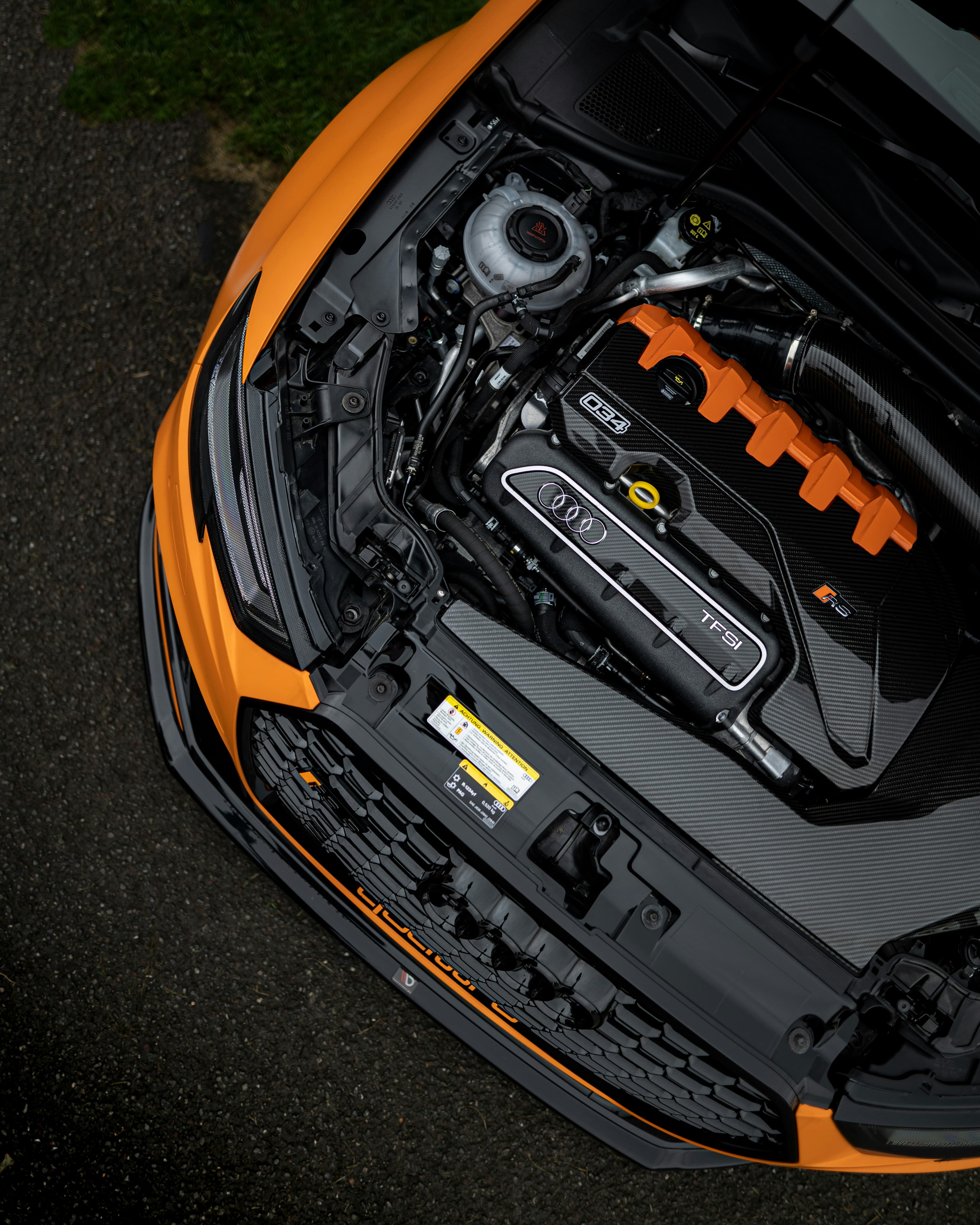 Audi RS3 engine bay with 034 Motorsport carbon intake, photographed from above